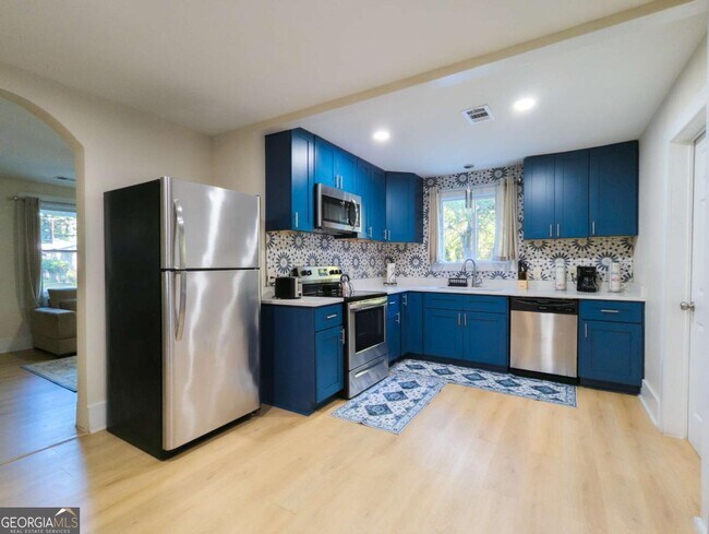 Building Photo - 6557 Woodrow Rd