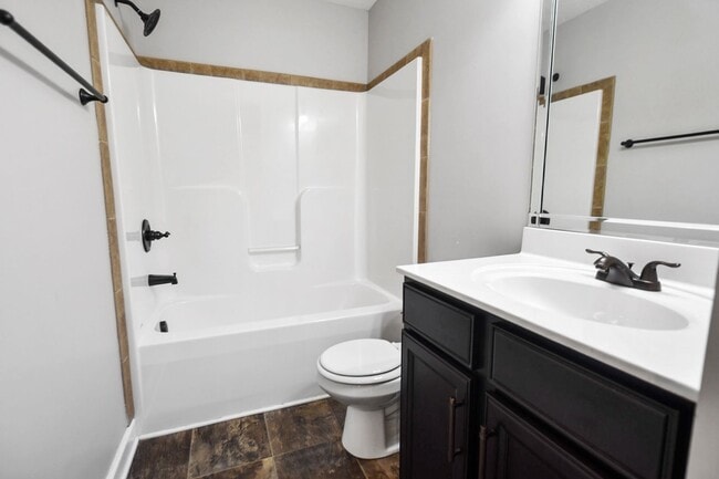 Building Photo - Pet Friendly Three Bedroom with Bonus!