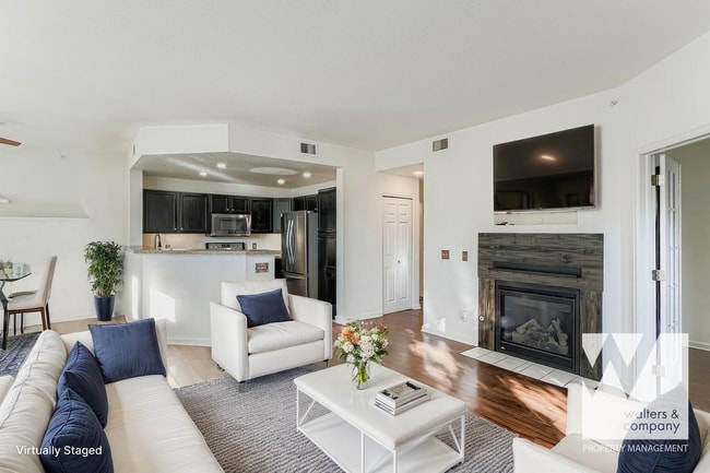 Building Photo - Light-Filled Corner Condo with Garage + Covered Parking in Gated Community