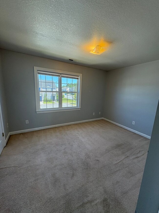 Building Photo - Charming two bedroom one and a half bath town home that is centrally located. Just a short drive ...