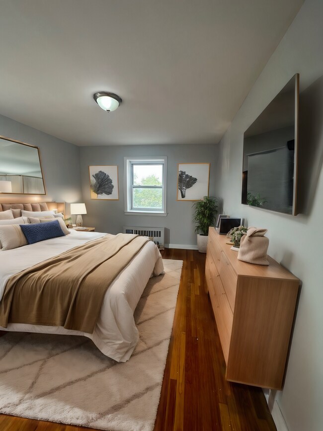 Building Photo - Rose Garden - Your Gateway to Modern Living and Seamless NYC Commutes!