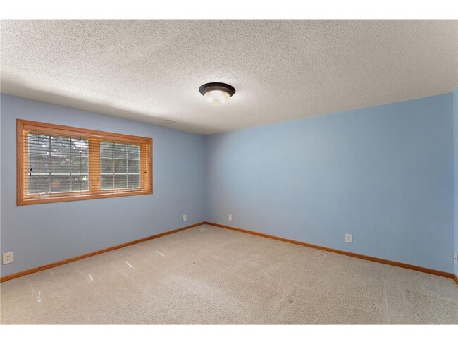 Building Photo - 7590 4th St Ln N