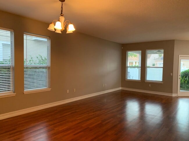 Building Photo - MOVE IN SPECIAL- Charming 3/2 home w/ formal office/4th bedroom and fenced yard in Harmony