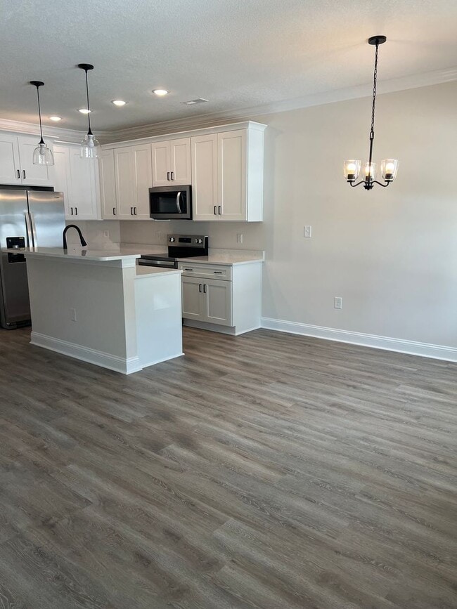 Building Photo - June availability! Brand New! Beautiful Fi...