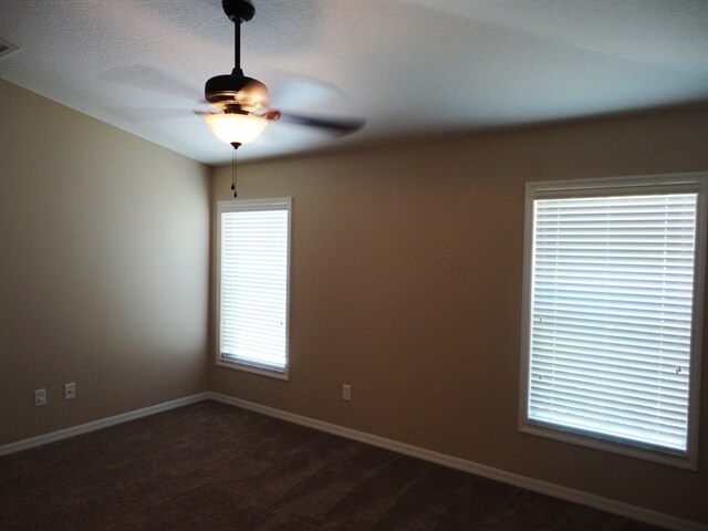 Building Photo - 18025 Cypress Bay Pky