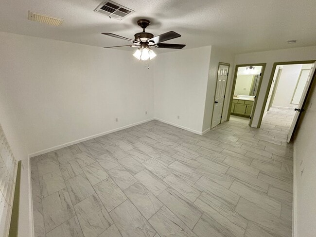Building Photo - This inviting single-story home boasts a s...