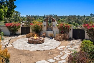 Building Photo - This Beautiful Hacienda Style Home combine...
