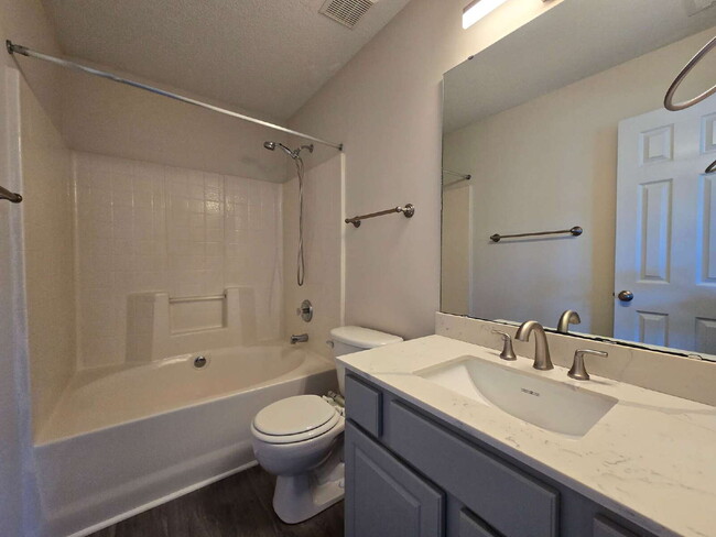 Building Photo - A home that exudes Warmth and Style