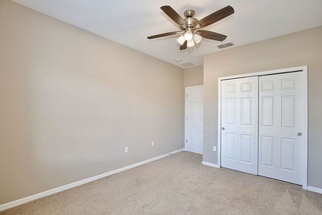 Building Photo - Gorgeous 4/2.5 Spacious Townhome with a Loft Area and a 2 Car Garage in the Desirable Gated Commu...