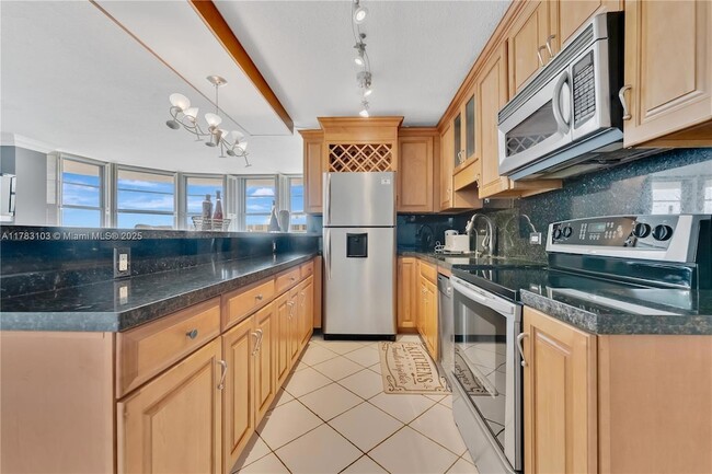 Building Photo - 5555 Collins Ave
