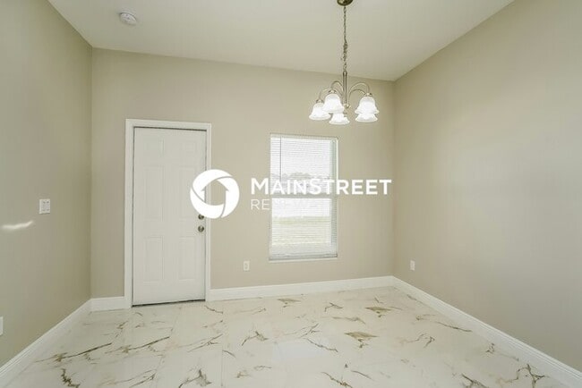 Building Photo - 3 Bedroom Pet-Friendly Home in LEHIGH ACRE...