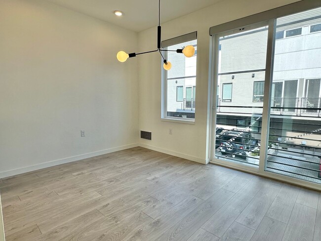 Building Photo - Modern home w/rooftop deck in desired Cher...