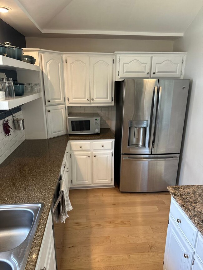 Building Photo - Available June 1st! Beautiful 4-Bedroom, 2...