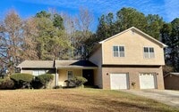 Building Photo - JUST REDUCED...UNDER $1,300!!-3 Bed/2 Bath Duplex With Attached Garage in Lovely College Park!