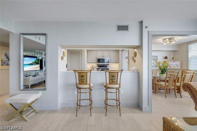 Building Photo - 6361 Pelican Bay Blvd