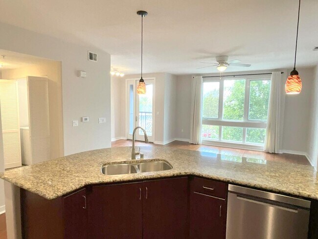 Building Photo - Great Corner Condo ! Lots Of Light ! Elan ...