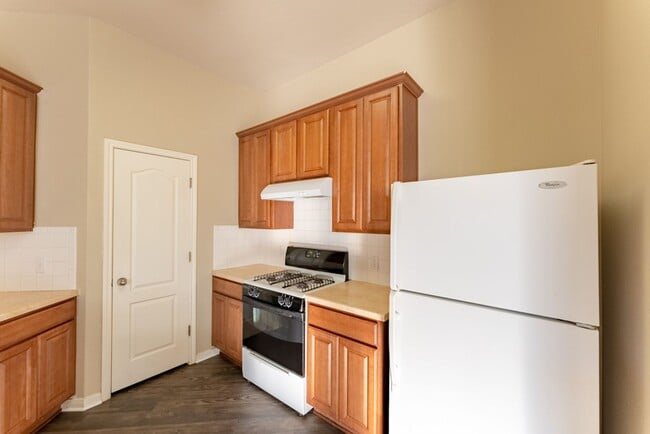 Building Photo - Charming Brick Home with Open Floorplan, Vaulted Ceilings, and Luxurious Amenities—Perfect for An...