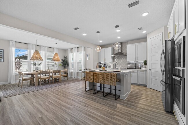 Building Photo - "Luxurious Furnished Home with 4-Bed, 3-Bath, Swim Spa Fenced Yard Golf Cart steps to the beach!"