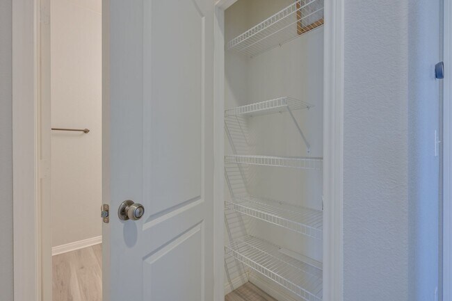 Building Photo - NW!! Gated!! Community Pool/Spa  Recreation Room!! New Paint!! New Flooring!!  Balcony!!  2 car g...