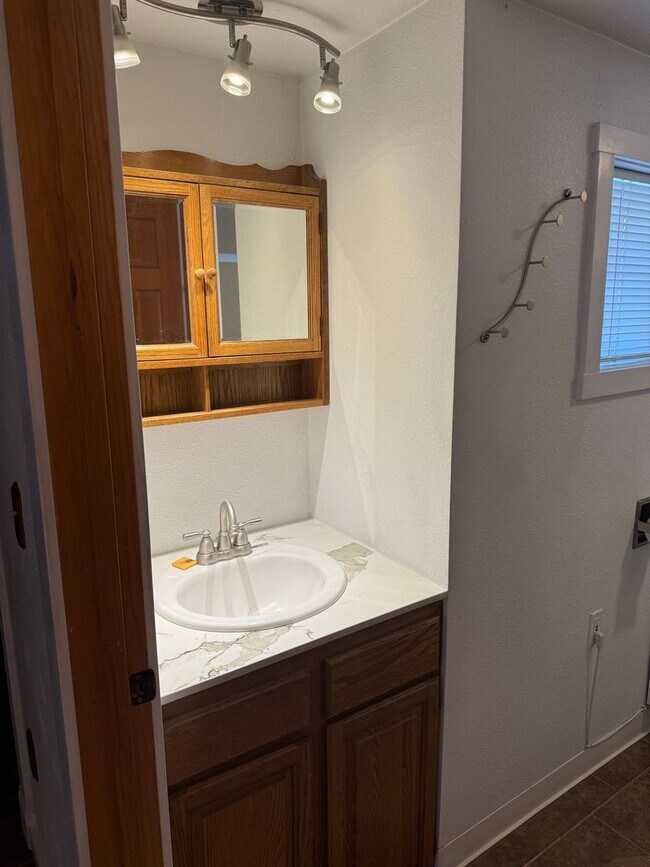 Building Photo - Beautiful 4-Bedroom Home on a Private, Treed Lot in North Ellensburg