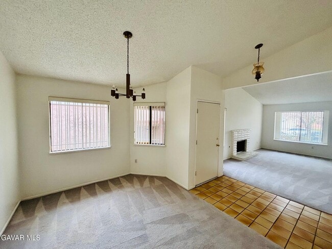 Building Photo - 3220 E Ave S2