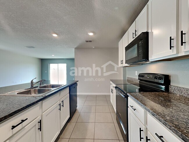 Building Photo - 10416 Flathead Dr