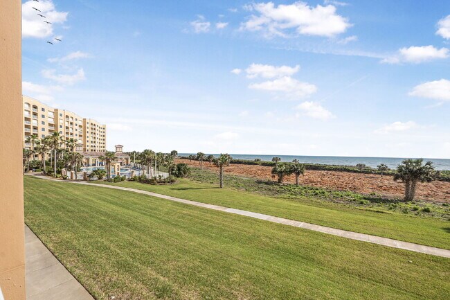 Building Photo - Available for a 7-12 month lease, Unit 208 has a beautiful oceanfront setting.