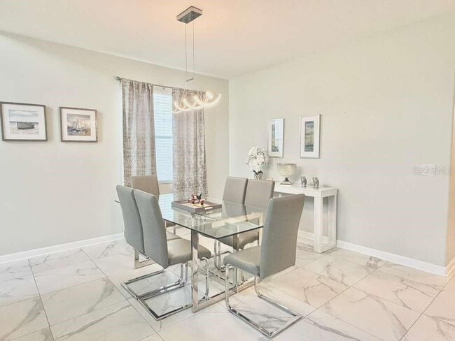 Building Photo - 8894 Candy Palm Rd