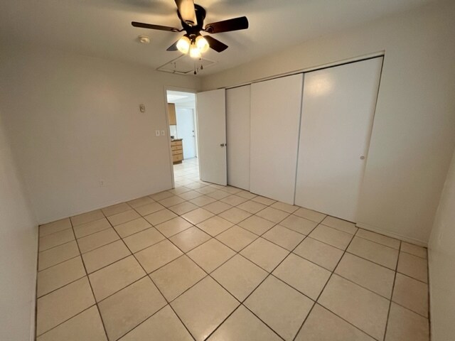 Bedroom with closet and ceiling fan - 6100 Dr Martin Luther King Jr St N