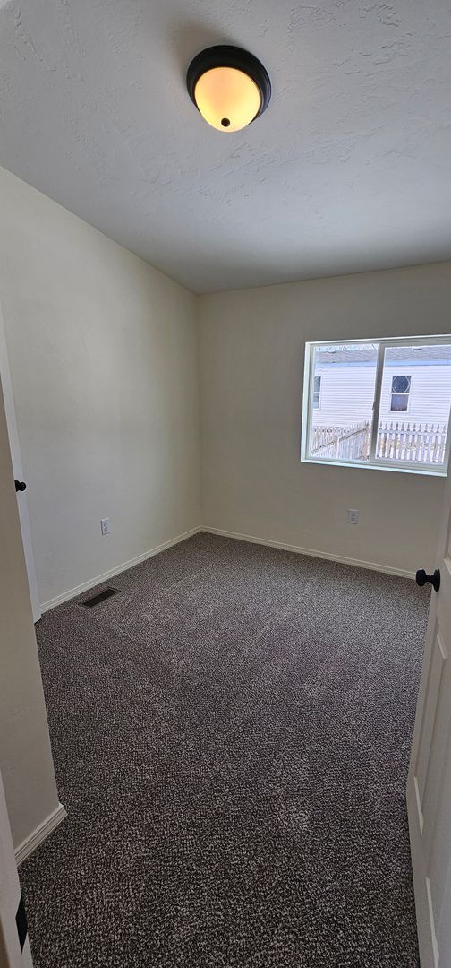 Building Photo - Fully Renovated 3Bd/2Ba Home in River Rock Fenced Yard Pet Friendly