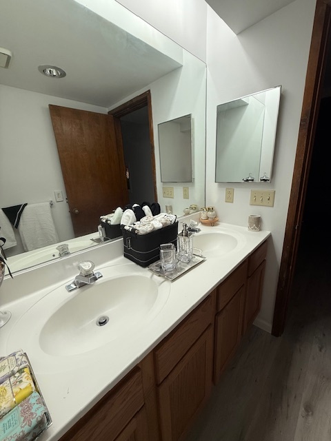 Spacious bath with double Corian sinks. - 1053 Danby Rd