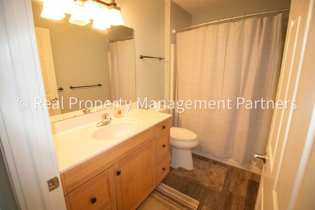 Building Photo - Spacious 3BR Townhome in Lowell | Nature Views & Maintenance-Free Living