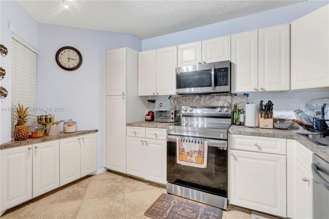 Building Photo - 3050 NW 42nd Ave