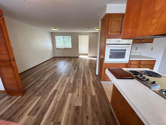 NEW Living Room with vinyl floors - 8519 49th St W