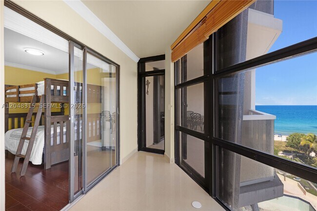 Building Photo - 6423 Collins Ave
