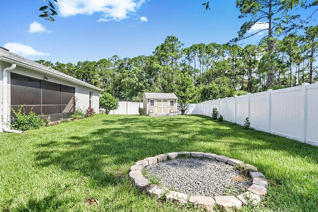 Building Photo - Modern 4-Bedroom, 3-Bath Home with Private In-Law Suite – Palm Coast, FL