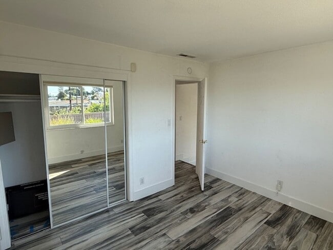 Building Photo - Remodeled 3 Bedroom Home with Bay Views + Stunning Backyard Patio