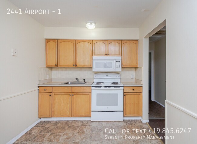 Building Photo - 2441 Airport-1