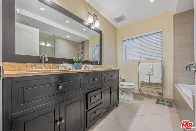 Building Photo - 5659 Corbin Ave