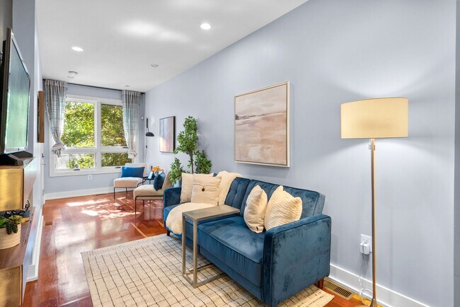 Building Photo - Stylish 2-Level Condo with Private Yard & Chef’s Kitchen Near Petworth Metro!