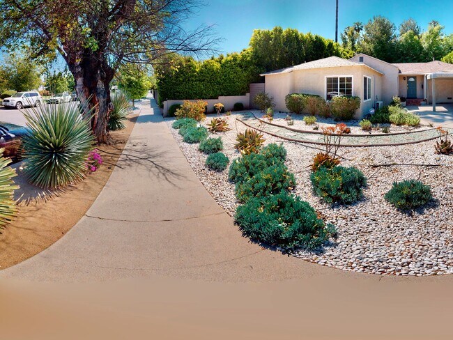 Sidewalk out front... - 18406 Bessemer St