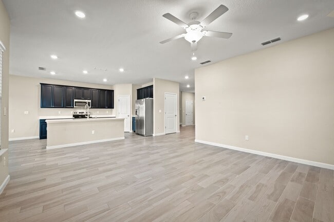 Building Photo - Spacious 4-Bedroom Home with Screened Pati...