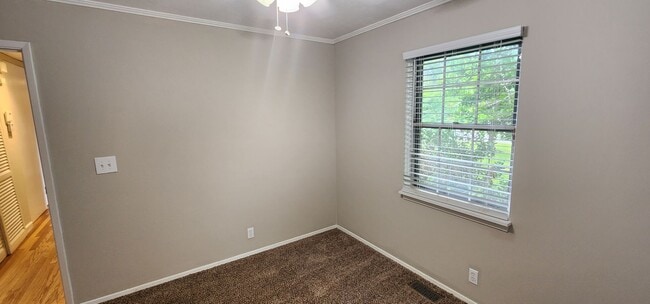 Building Photo - Check This One OUT!! To View is to Rent! 3 Bedroom, 1 Bath. Hardwood Floors, Tile and Newer Carpe...