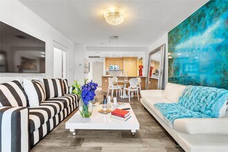 Building Photo - 10275 Collins Ave