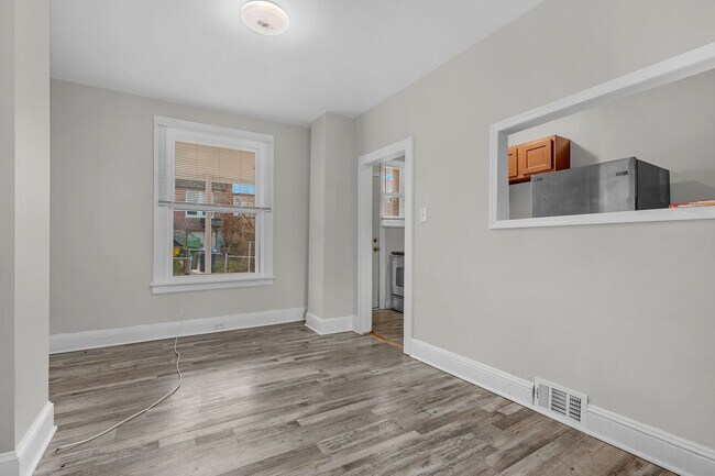 Building Photo - Charming Updated Rowhome in Belair-Edison – Move-In Ready!