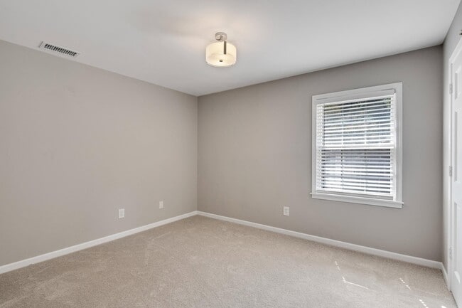 Building Photo - 7691 McHenry Cir N