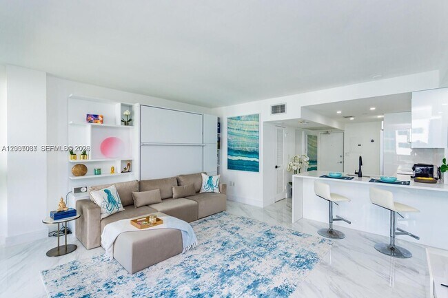Building Photo - 10275 Collins Ave