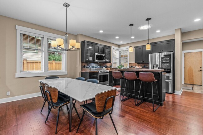 Building Photo - Grand Northwest Crossing Home. Fully furnished monthly rental. Walk to Compass Park. All Utilitie...