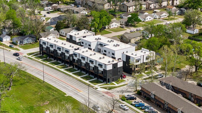 Building Photo - Discover modern elegance in the newly constructed Edgewater Condominiums, a boutique community fe...