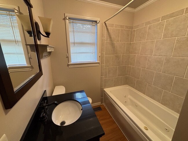 Building Photo - Welcome to this charming 3-bedroom, 2-bathroom home located in the desirable west side of Russell...